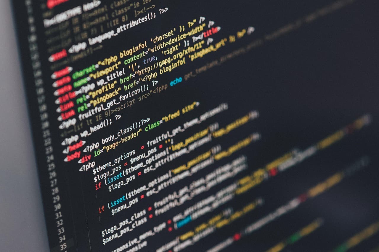 Code displayed on a computer monitor representing agentic coding workloads