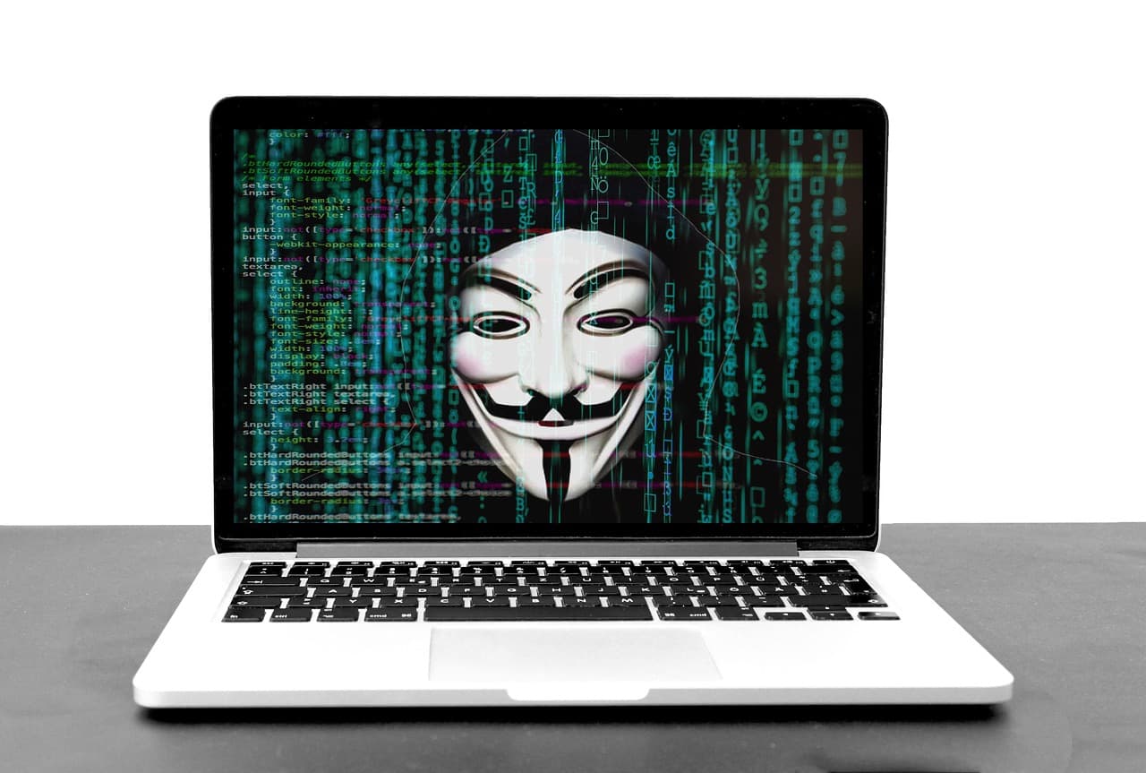 Anonymous hacker silhouette representing an AI agent operating outside the boundary of its intended sandbox